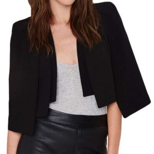 Black cape blazer.
